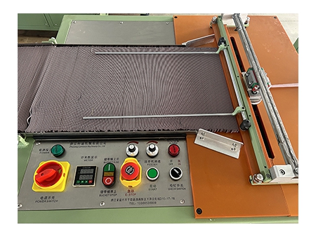 Tape Festooning Machine  Semi-automatic packing machine for handling elastic and rigid tapes