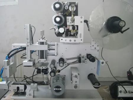 Semi-Automatic Flat Surface Labeling Machine